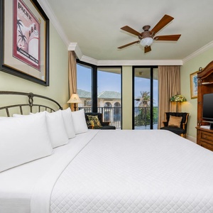 Unwind after a fun vacation day and stream your favorite shows in the king master suite with balcony access