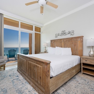 Relaxing master bedroom, featuring a king bed and access to the balcony with stunning beach views
