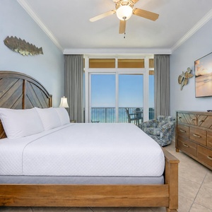 Drift into restful sleep in the king master suite as morning light brightens the coast beyond your balcony