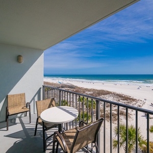 Relax on your balcony with a gentle breeze and the rhythmic sound of waves meeting the shore