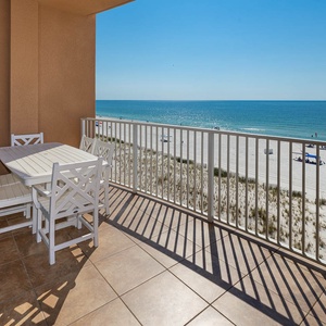 Enjoy meals at the outdoor dining table while taking in the expansive views of the tranquil waters and shoreline