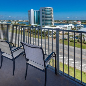 Enjoy a relaxing moment in the outdoor guest room balcony, taking in the vibrant views of the surrounding landscape