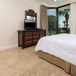 Unwind after a fun vacation day and stream your favorite shows in the queen master suite with balcony access