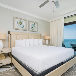 Experience restful nights with the sights and sounds of the coast from this relaxing master suite