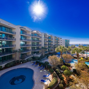 Discover the pool area with a refreshing lazy river and thrilling waterslide, just steps from the bay