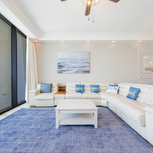 Unwind in the inviting living area featuring plush seating, queen sofa sleeper, and a relaxing vibe