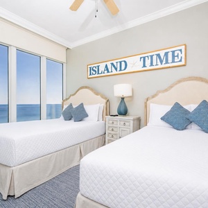 Experience peaceful mornings in this queen guest suite, where soft bedding and refreshing beach views inspire relaxation