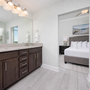 Freshen up in this guest bath in the relaxing shower or soothing tub before an exciting beach day