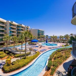 Discover tranquil moments from the balcony, taking in the vibrant poolside sights and bay view beyond