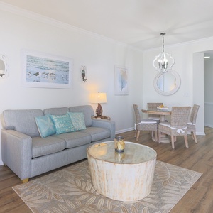 Relax on the cozy sofa with a queen sleeper after a day at the beach and unwind