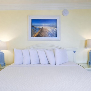 Retreat to the master suite after a day at the beach and relax