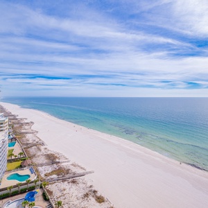 Enjoy stunning coastal views from your balcony as you relax and take in the soothing sounds of the beach