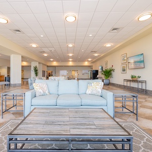 The inviting lobby features comfortable seating, a convenient coffee area, and vending machines for a quick refreshment anytime