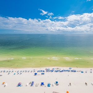 Relax on your balcony and bask in the sunlight with mesmerizing views of the gulf coast on your beach retreat