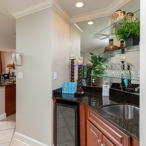 Grab a chilled bottle from the wine cooler or create your favorite cocktail at the wet bar