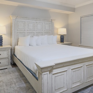 Retreat to the king master suite with cozy bedding after a day of adventure and drift off into a peaceful slumber