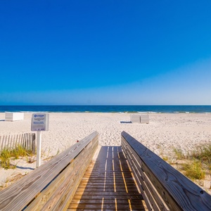 Step onto the boardwalk and take in the stunning beachfront view, perfect for relaxing walks and seaside adventures