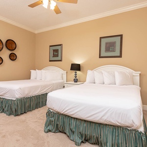 Relax on one of the cozy queen beds in this guest suite and enjoy a peaceful slumber