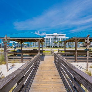 Just a short walk across the street puts you right on the sandy beach and near the sparkling Gulf waters
