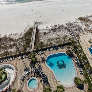 Discover the refreshing pool area with gradual entry, indoor hot tubs and pool, lazy river, and waterslide