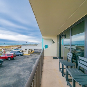 Unwind in the on your balcony, enjoying the tranquil views and soothing sounds of the shore