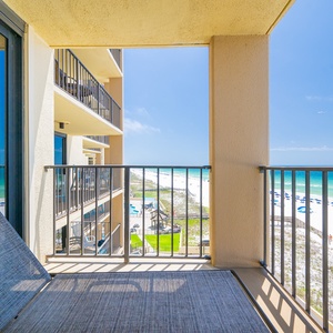 Breathe in the fresh coastal air on your balcony, soaking in vibrant beach views and relaxing