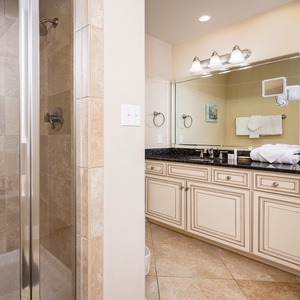 Indulge in relaxation in the master bath with a refreshing walk-in shower and soothing jetted tub