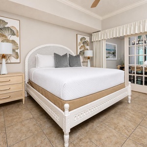 Dream of sinking into the plush king bed in the master after a day of beach fun, surrounded by calming coastal decor