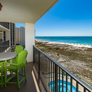 Embrace the beach vibe at your balcony table, where you can unwind while soaking in panoramic coastal views