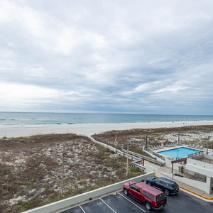 Experience refreshing beachfront views from this inviting space, perfect for relaxation and unwinding by the water