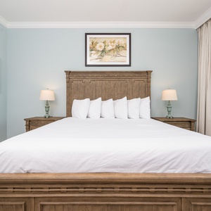 Serene master bedroom featuring a king bed, soft pillows, and calming decor for a restful stay