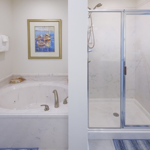 Soak in the jetted tub and feel gentle bubbles or step into the enclosed shower for a warm, steamy wash