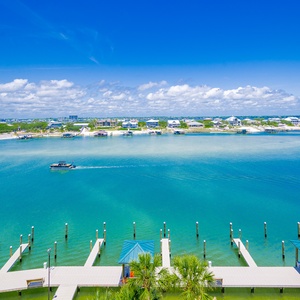 Compliment your vacation with tranquil waters and a vibrant blue sky, perfect for a relaxing getaway by the water