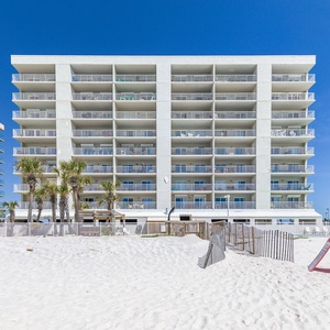 Discover this beachfront property with easy access to soft sands and stunning views from your private balcony