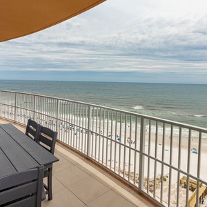 Enjoy coffee on your corner balcony while watching waves roll along the beach and feeling the gulf breeze