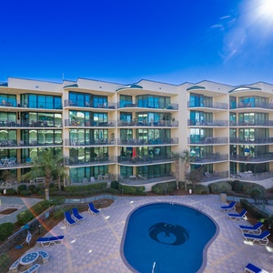 Spend the day lounging by the pool or on the balcony of your vacation oasis retreat