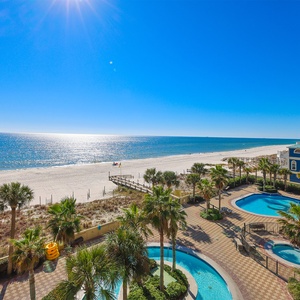 Relax on your balcony and bask in the sunlight with mesmerizing views of the gulf coast on your beach retreat
