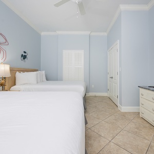 Unwind in this queen guest suite and stream your favorite shows or enjoy a good movie after a beach day