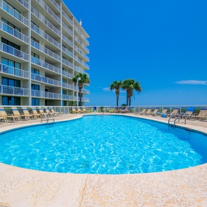 Relax in beach chairs just steps from your rental, with stunning views and easy access to sun and sand