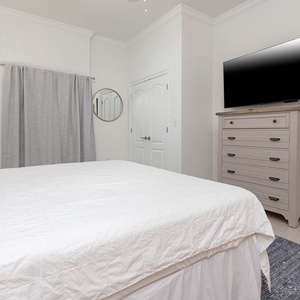 Enjoy a movie or stream your favorite show in the king guest suite surrounded by fluffy pillows