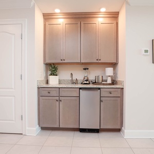 Blend smoothies at the wet bar, chill drinks in the stainless fridge, or grab snacks for the beach