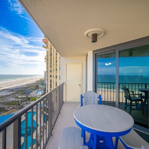 A coastal breeze stirs as you watch the beach and pool activities from your balcony