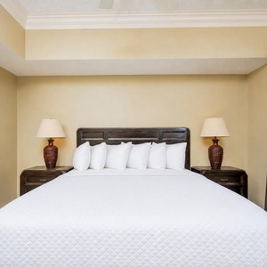 Sink into the cozy king bedding of this master suite, inviting restful nights and rejuvenating mornings