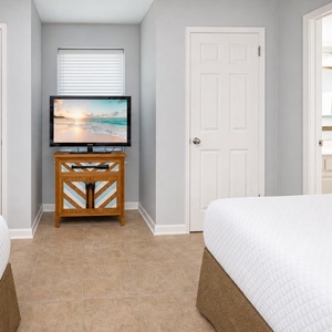 Unwind in this guest suite with two beds and stream your favorite shows or enjoy a good movie after a beach day