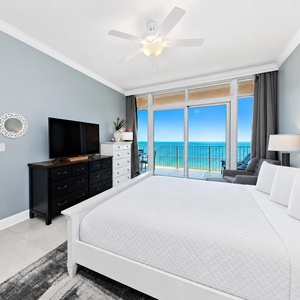 Breathe coastal air through open sliding doors while relaxing in the king master suite
