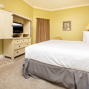 Unwind in this king guest retreat, where plush bedding invites you to relax with a good movie