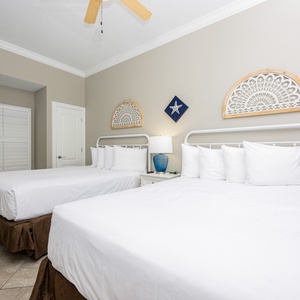 Relax on one of the cozy queen beds in this guest suite and enjoy a peaceful slumber