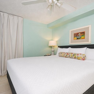 A soothing king suite welcomes you with a plush bed and peaceful lighting for restful nights