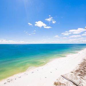 Breathe in the fresh coastal air as you relax on your balcony, taking in breathtaking views of the beach