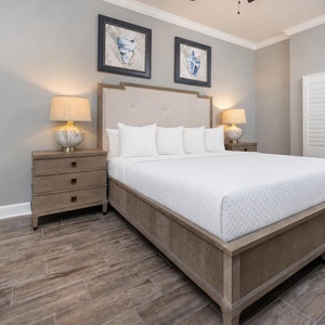 Relax on the cozy king bed in this guest suite to unwind after a day of adventure